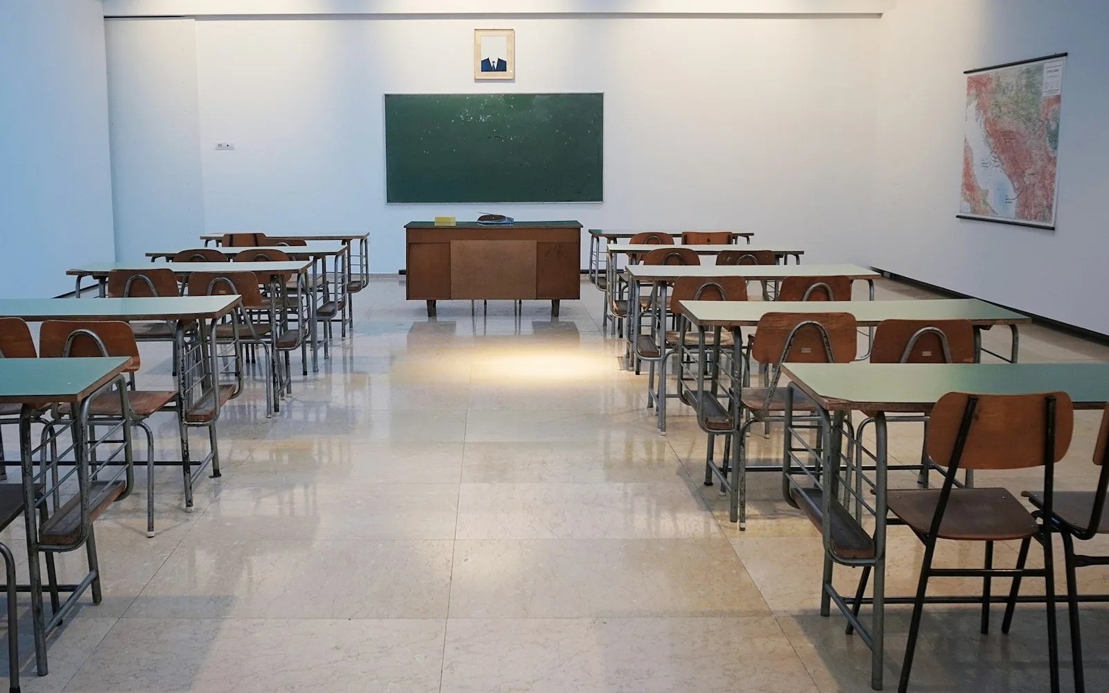 Empty school classroom with desks
